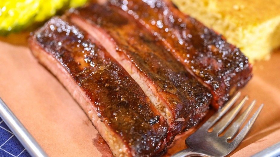 Glazed smoked pork ribs on a tray at Carolina Kitchen & BBQ Co.